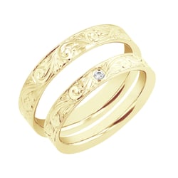 Vintage Eheringe mit Gravur und einem Diamanten Denton