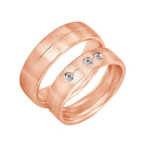 Goldene Eheringe mit drei Diamanten Ralio