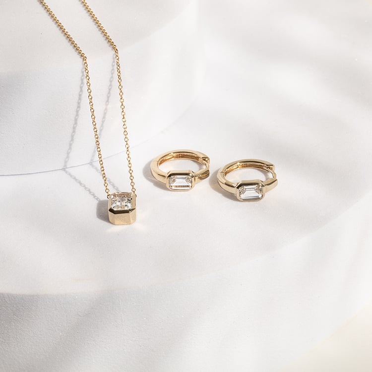 Silbernes Schmuckset mit weißen Topasen Toula 143056