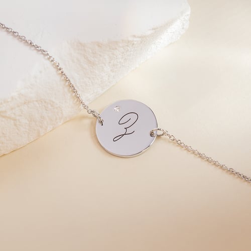 Goldarmband mit Diamanten und Gravur eines Buchstabens Dian
