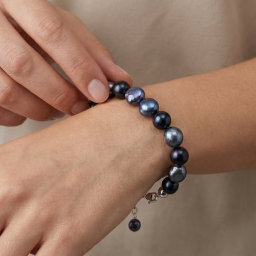 Armband mit dunklen Perlen Kiwa