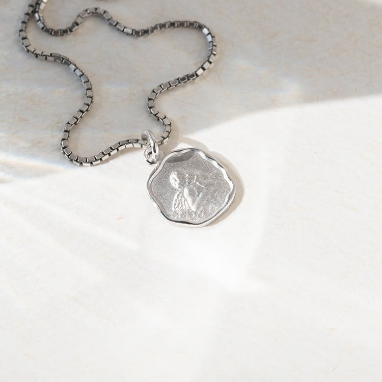 Silberner Anhänger mit dem Engelssymbol Raguel 140332