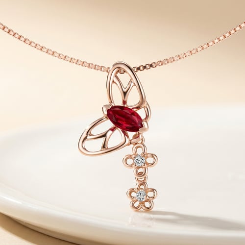 Goldener Anhänger mit Rubinen und Diamanten Papillon