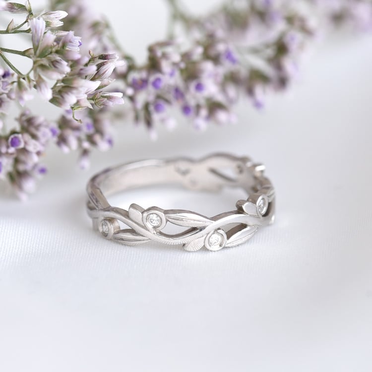 Floraler Damenring mit Diamanten und dezenter Herrenring Emery 79727