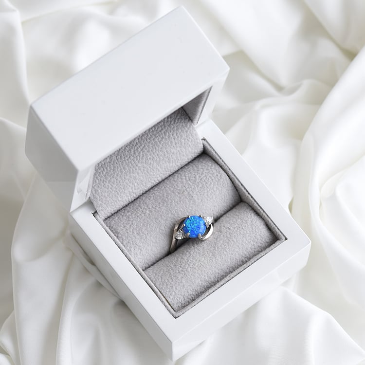 Silberner Ring mit blauem Opal und Zirkonia Jimena 84700