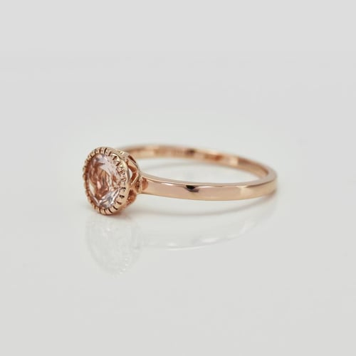 Ring aus Gold mit Morganit Swan