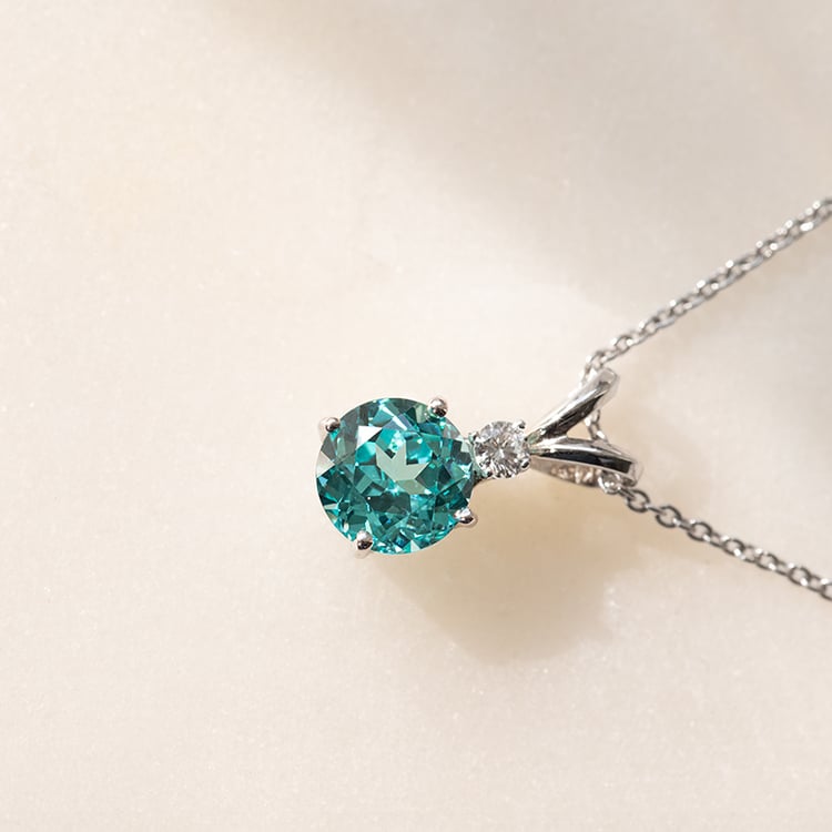Goldener Anhänger mit rundem Lab Grown Paraiba Turmalin Marco 136943