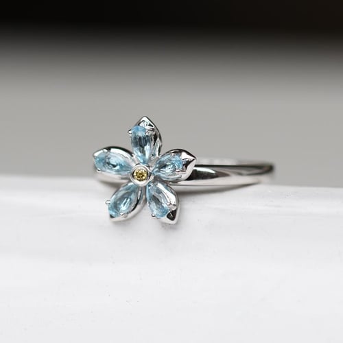 Verlobungsring mit Topasen und Diamanten Zusia