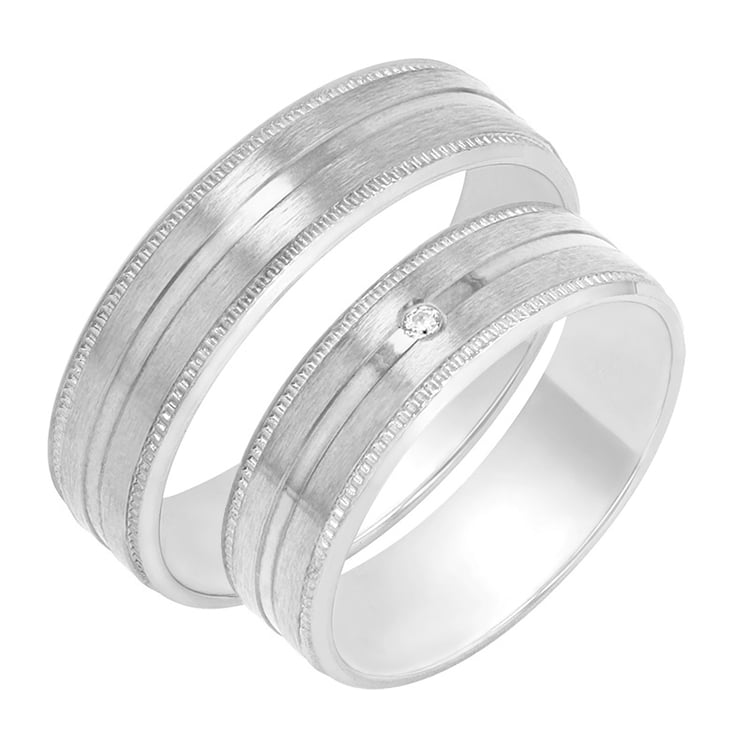 Zarte Eheringe mit einem Diamanten Cupid 78799