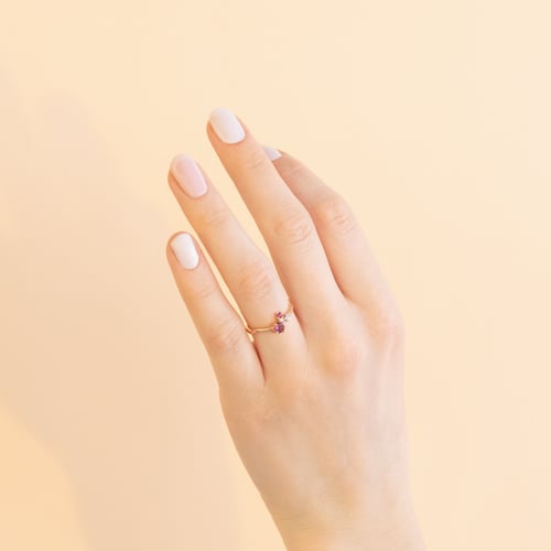 Silberner Cluster-Ring mit Turmalin, Tansanit, Rubin und einem Diamanten Roche