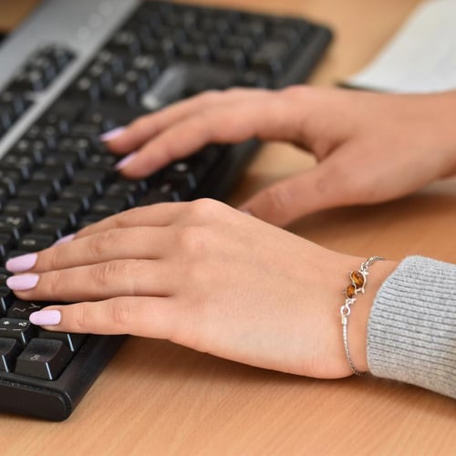 Silbernes Armband mit Bernstein und Delfin Kisha