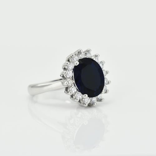 Goldener Ring mit blauem Saphir und Diamanten Tubiah