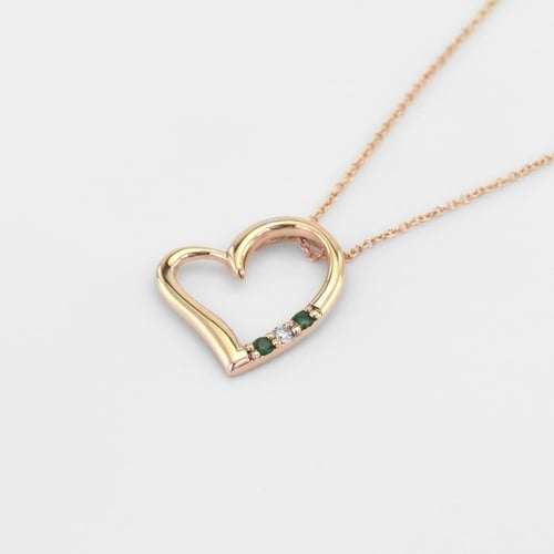 Anhänger in Herz-Form aus Gold mit Smaragden und Diamant Tanish
