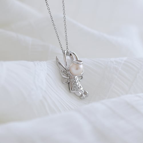 Engel mit Perle und Diamanten Angel