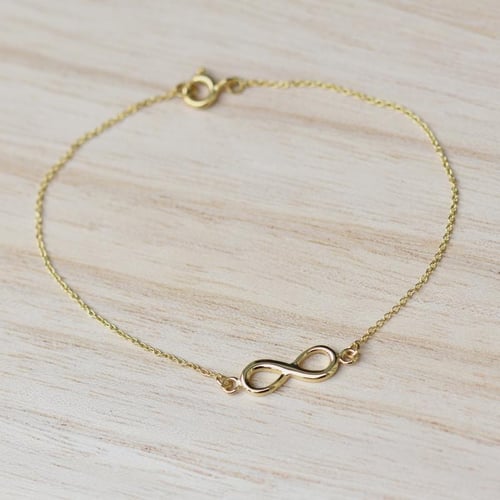Schmuckset aus Gold mit Unendlichkeitszeichen Infinity