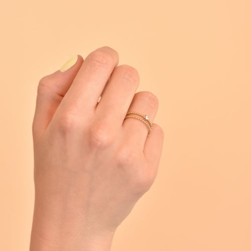 Verlobungsring aus Kugeln mit einem Diamanten Kaiya
