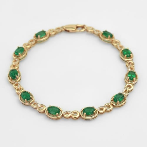 Armband mit Smaragden aus Roségold mit Diamanten Tarak