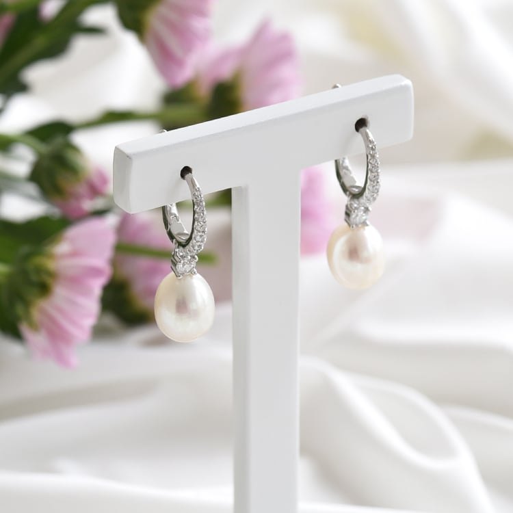 Silberne Ohrringe mit Perlen und Zirkonia Fauna 83476