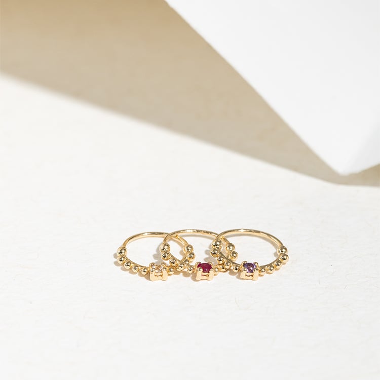 Goldenes Septum Piercing mit weißen Topasen Arla 123053