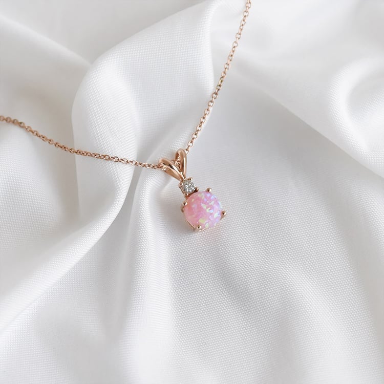 Goldener Anhänger mit rosa Opal und Diamant Mirela 93692