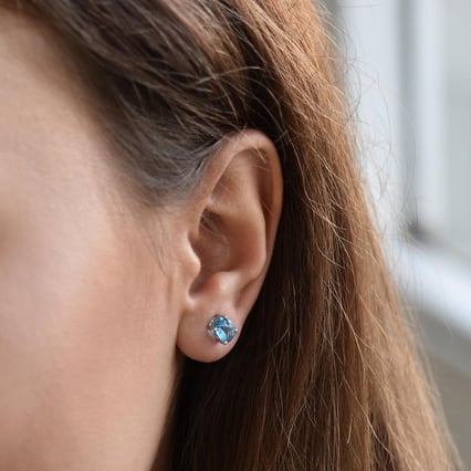 Goldene Ohrringe mit ovalen Topasen Qati