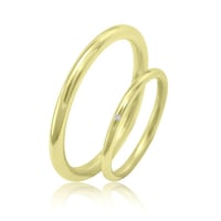 Dezente Trauringe aus Gold mit Diamant Alays
