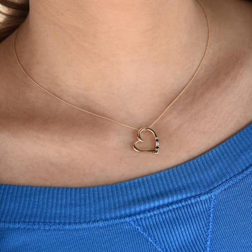 Silberner Anhänger mit einem Herzen und schwarzen und weißen Diamanten Tanish
