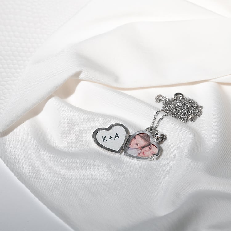 Silbernes Medaillon in Herzform zum Öffnen 131015