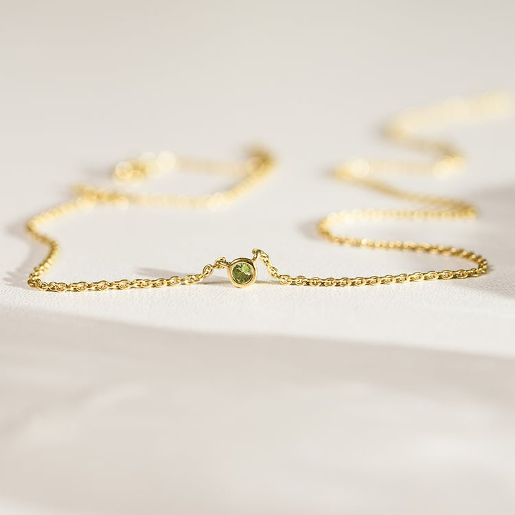 Silberne minimalistische Kette mit einem grünen Saphir Glosie 157133