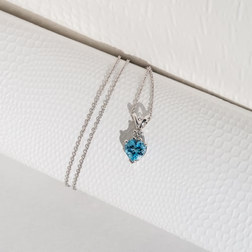 Goldanhänger mit Topas und Diamanten Dorevie