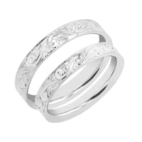 Vintage Eheringe mit Gravur und einem Diamanten Denton