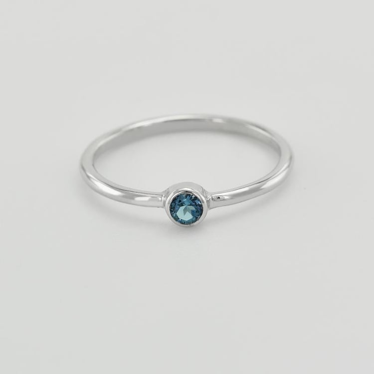 Goldener minimalistischer Ring mit London Topas Emilien 33800