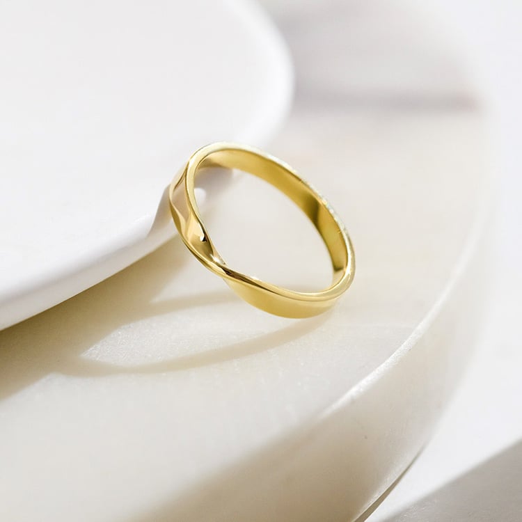 Verdrehte goldene Eheringe mit Diamanten Brielle 154452