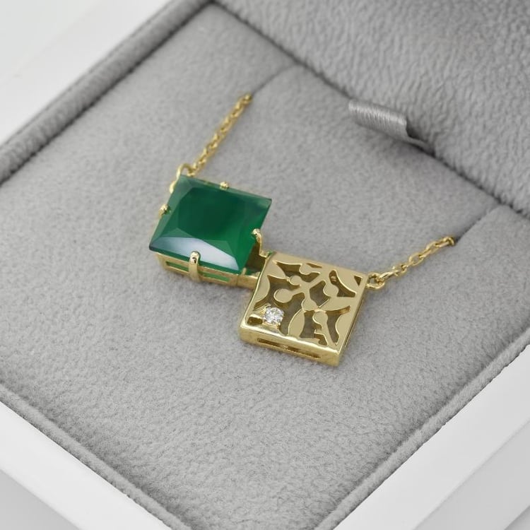 Goldene atypische Halskette mit Onyx und Diamant Cadencia 43380