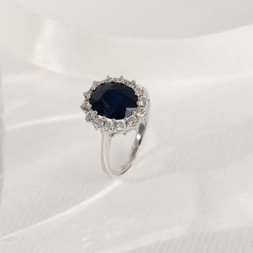 Eleganter Halo Verlobungsring mit Saphir und Diamanten Chrys