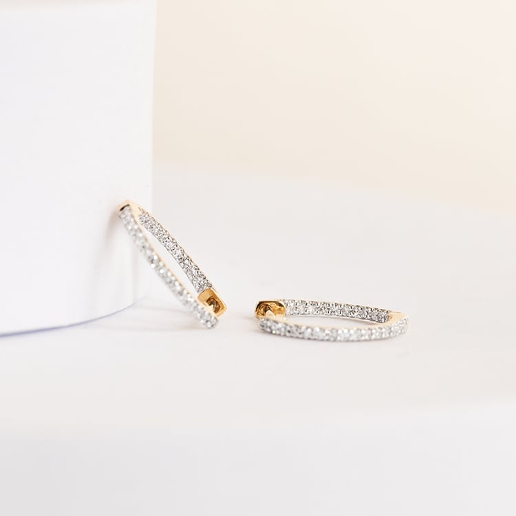 Goldene runde Ohrringe mit Diamanten Genji 142306