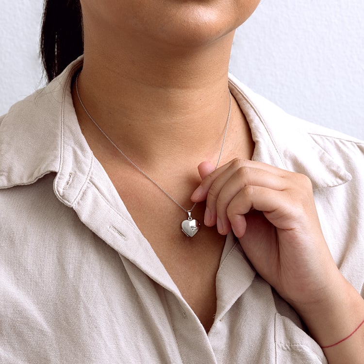 Silbernes Medaillon in Herzform zum Öffnen 129374