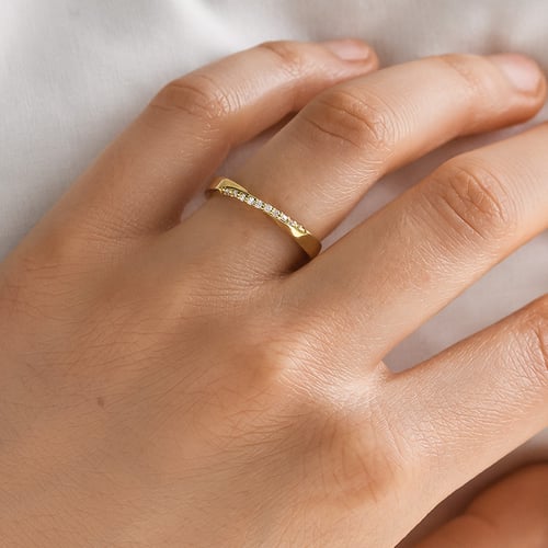 Verdrehte goldene Eheringe mit Diamanten Brielle