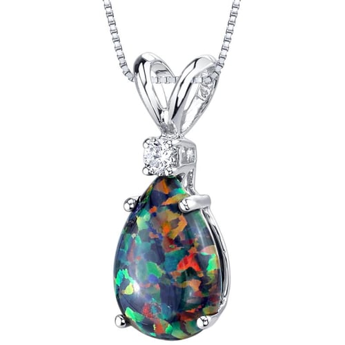 Goldener Anhänger mit schwarzem Opal und Diamant Raulla