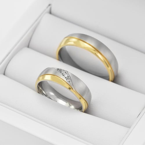 Eheringe aus mehrfarbihen Gold mit Diamanten Muze