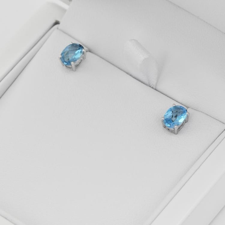 Goldene Ohrringe mit ovalen Topasen Qati 36965