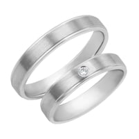 Goldene Eheringe mit Diamant Jans