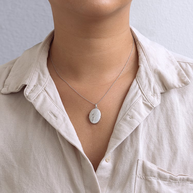 Silbernes Medaillon mit Muster zum Öffnen 130414