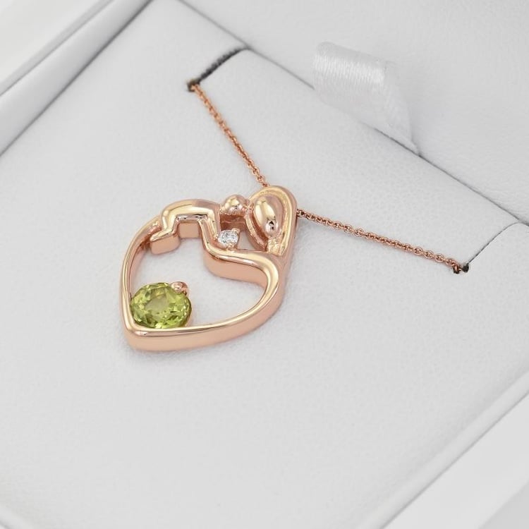 Halskette mit Olivin und Diamanten in Rosegold 35304