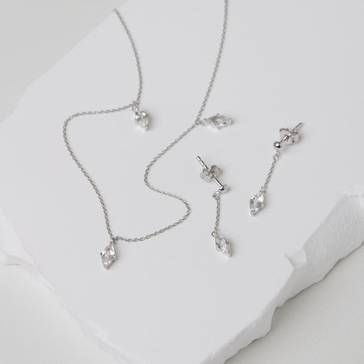 Goldenes Schmuckset mit weißen Topasen 164076