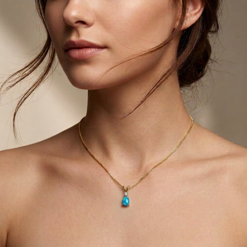 Goldener Anhänger mit blauem Opal und Lab Grown Diamant Raulla
