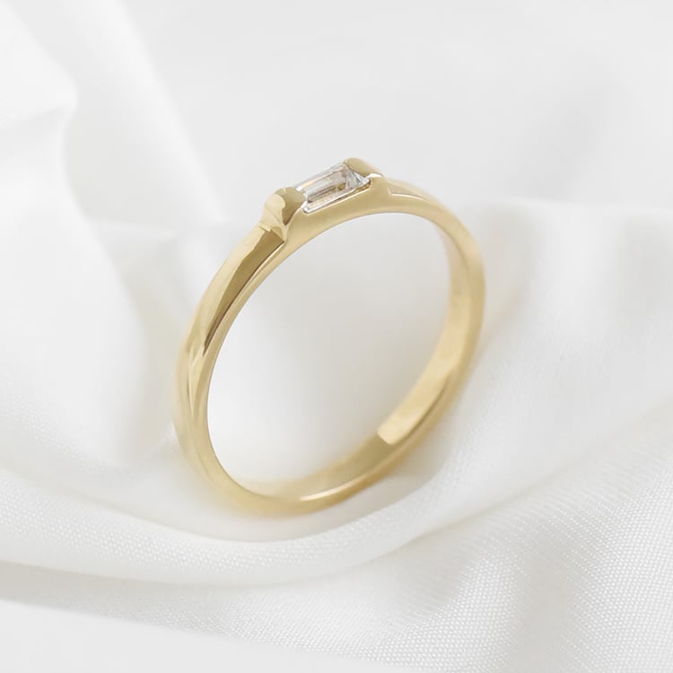 Ring mit einem Diamanten in Baguette-Form Xenia 119487