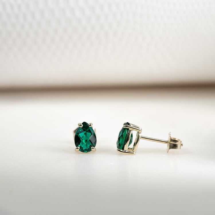 Ohrringe aus Gold mit Tropfenschliff Smaragden Reata 133821