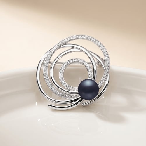 Elegante silberne Brosche mit schwarzer Perle und Zirkonia Nerida
