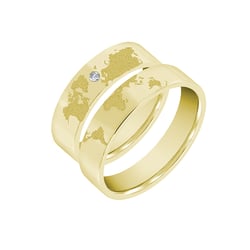 Goldene Trauringe mit Gravur der Weltkarte und Diamant Zeoni